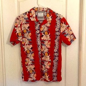 Button down Hawaiian shirt. Red with floral design. Medium, runs small.
